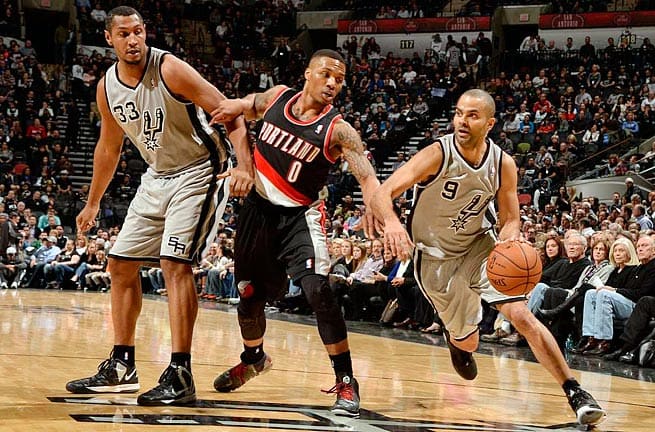 The matchup between Tony Parker (right) and Damian Lillard (center) will help dictate the series.